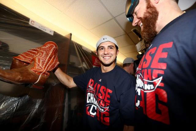 TORONTO, ON - OCTOBER 19: Ryan Merritt #54 of the Cleveland Indians celebrate with his teammates in the locker room after defeating the Toronto Blue Jays with a score of 3 to 0 in game five to win the American League Championship Series at Rogers Centre on October 19, 2016 in Toronto, Canada. (Photo by Elsa/Getty Images)