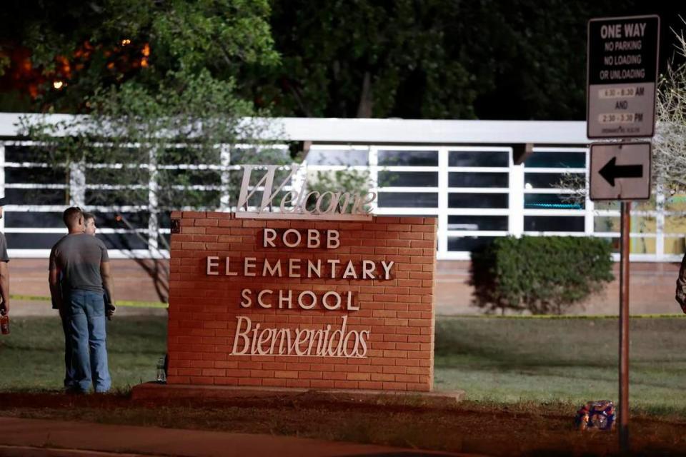 Police and investigators continue to work at the scene of a mass shooting at the Robb Elementary School in Uvalde, Texas