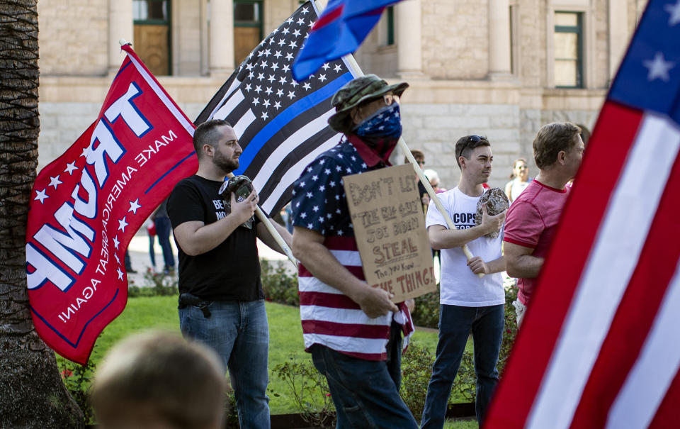 Trump supporters attend a "Stop The Steal" rally just hours after Joe Biden was named president-elect on Nov. 7, 2020, at the State Capitol in Phoenix. (Photo: Gina Ferazzi via Getty Images)