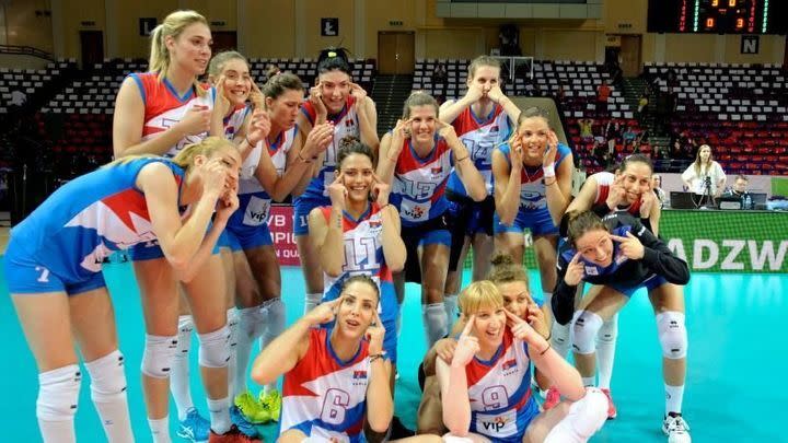 The Serbian women&rsquo;s volleyball team after their win against Poland in 2017. They stretched out their eyes, presumably to indicate they were heading to Japan for the championships. (Photo: FIVB)