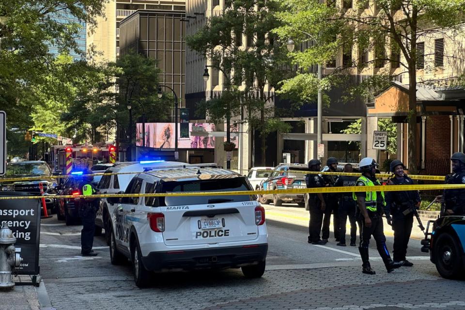 The hijacking came just two hours after a shooting at a food court in a downtown Atlanta in which a man shot three people (AP Photo/Jeff Amy)