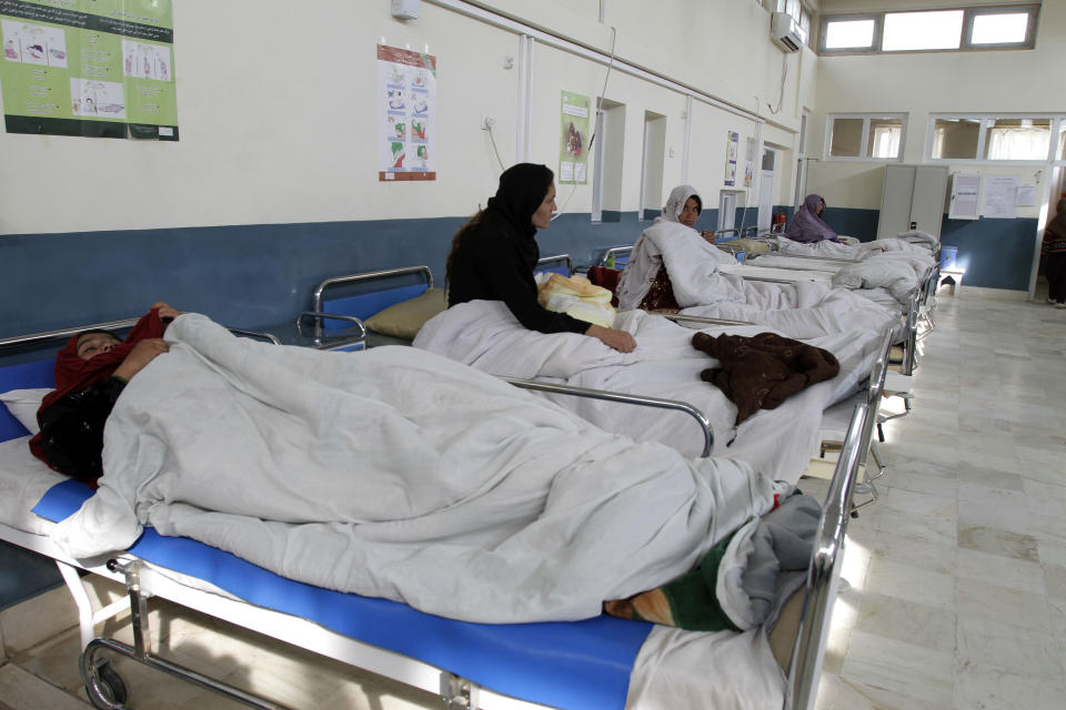 Afghan women and their newborns rest in the maternity ward of Ahmad Shah Baba District Hospital in Kabul, Afghanistan on Monday, Feb. 24, 2014. (AP Photo/Cassandra Vinograd)