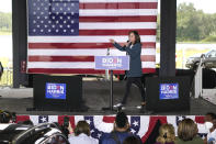 FILE - In this Monday, Oct. 19, 2020 file photo, Democratic vice presidential candidate Sen. Kamala Harris, D-Calif., speaks to supporters at a campaign event in Orlando, Fla. On Friday, Oct. 23, 2020, The Associated Press reported on a video circulating online incorrectly asserting only six people showed up at this campaign event for Harris. The video does not provide a full view of the audience at the “drive-in” rally where more than 50 cars were at the event, according to the pool reporter who was there. Harris and Democratic presidential candidate Joe Biden are purposefully limiting attendance at their events due to the coronavirus pandemic. (AP Photo/John Raoux)