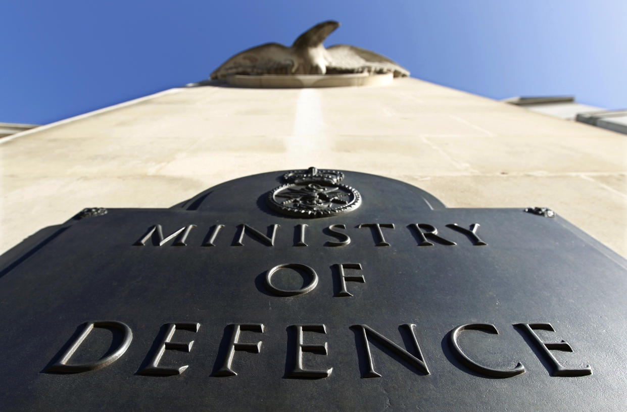 A plaque is seen on the Ministry of Defence building entrance in London, September 15, 2010. British legislators warned the government on Wednesday that the country's military capabilities and its ability to conduct current operations could be endangered if it goes ahead with deep defence cuts. REUTERS/Suzanne Plunkett (BRITAIN - Tags: POLITICS MILITARY)