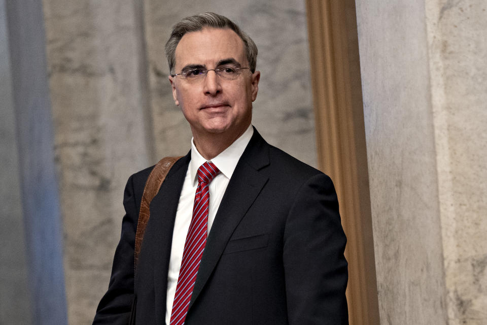 Pat Cipollone walks to the Capitol.