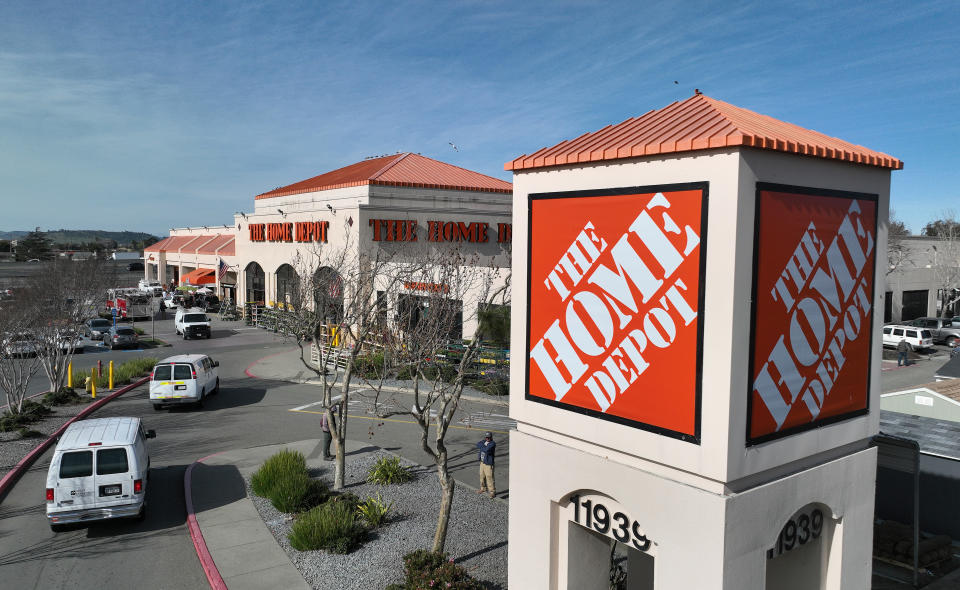 EL CERRITO, CALIFORNIA - FEBRUARY 21: In an aerial view, a sign is seen posted on the exterior of a Home Depot store on February 21, 2023 in El Cerrito, California. Home improvement retailer Home Depot announced plans to spend an estimated $1 billion to raise pay and benefits for hourly workers at its stores. (Photo by Justin Sullivan/Getty Images)