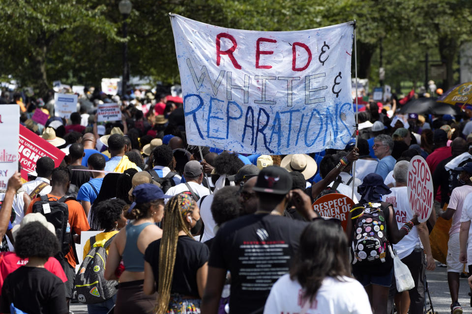 People march to honor the 60th Anniversary of the March on Washington, Saturday, Aug. 26, 2023, in Washington. (AP Photo/Jacquelyn Martin)