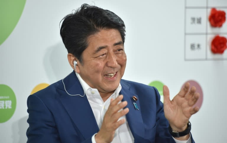 Voters handed Prime Minister Shinzo Abe's Liberal Democratic Party and its allies control of more than half of the upper house of parliament