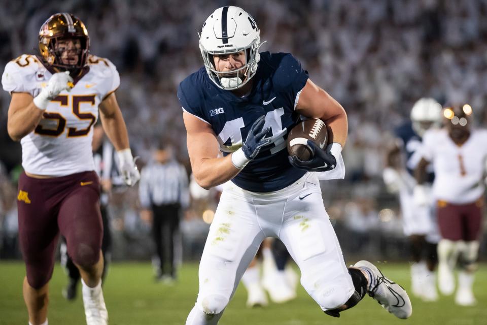 Penn State tight end Tyler Warren scores a touchdown on a 38-yard reception in the second quarter against Minnesota at Beaver Stadium on Saturday, Oct. 22, 2022, in State College.