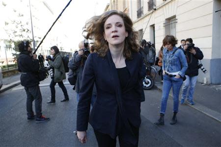 Nathalie Kosciusko-Morizet, conservative UMP political party candidate for the mayoral election, leaves after casting her ballot at a polling station in Paris March 23, 2014. REUTERS/Gonzalo Fuentes