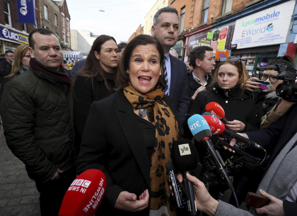 Sinn Fein leader Mary Lou McDonald speaks to the media during a walkabout in central Dublin, whilst on the General Election campaign trail on Thursday, Feb. 6, 2020. Ireland goes to the polls for a general election on Feb. 8. (Brian Lawless/PA via AP)