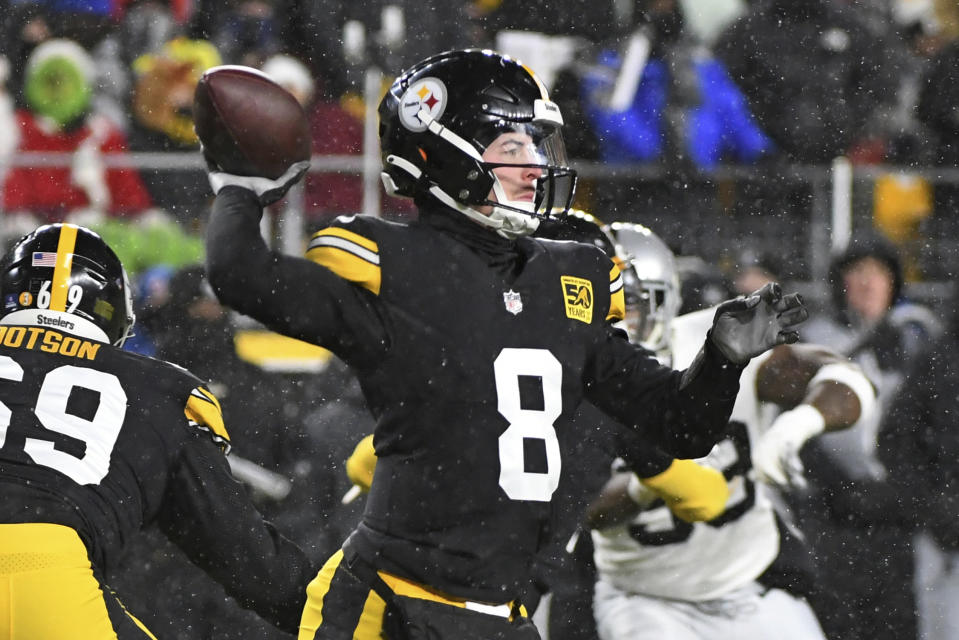 Pittsburgh Steelers quarterback Kenny Pickett (8) throws a pass during the first half of an NFL football game against the Las Vegas Raiders in Pittsburgh, Saturday, Dec. 24, 2022. (AP Photo/Fred Vuich)