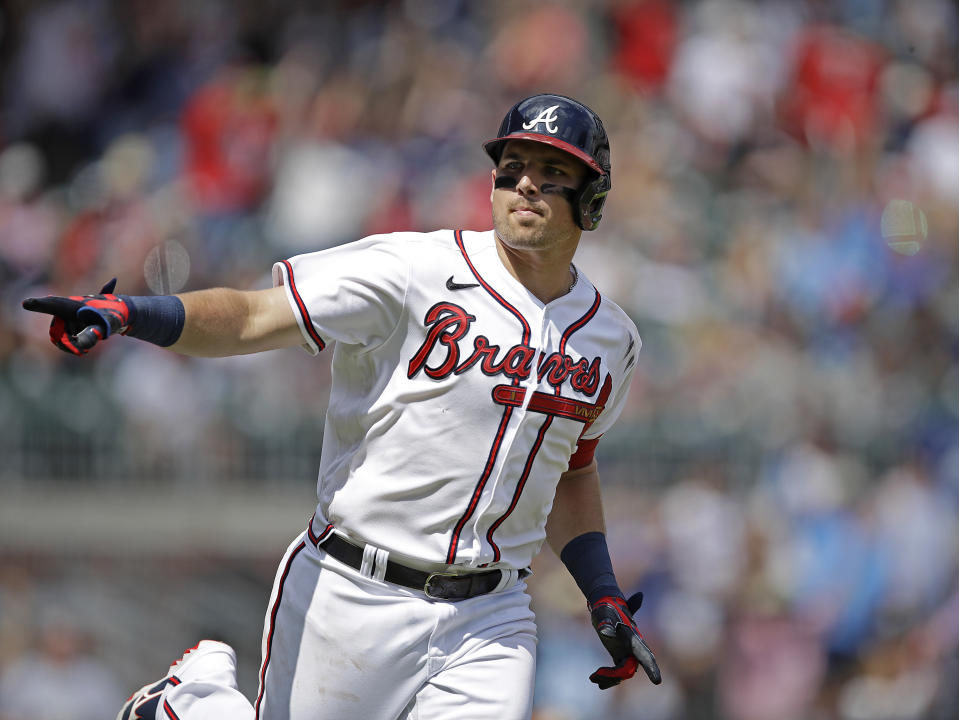 Atlanta Braves' Austin Riley celebrates after hitting a home run against the Washington Nationals in the eighth inning of a baseball game, Sunday, July 10, 2022, in Atlanta. (AP Photo/Ben Margot)