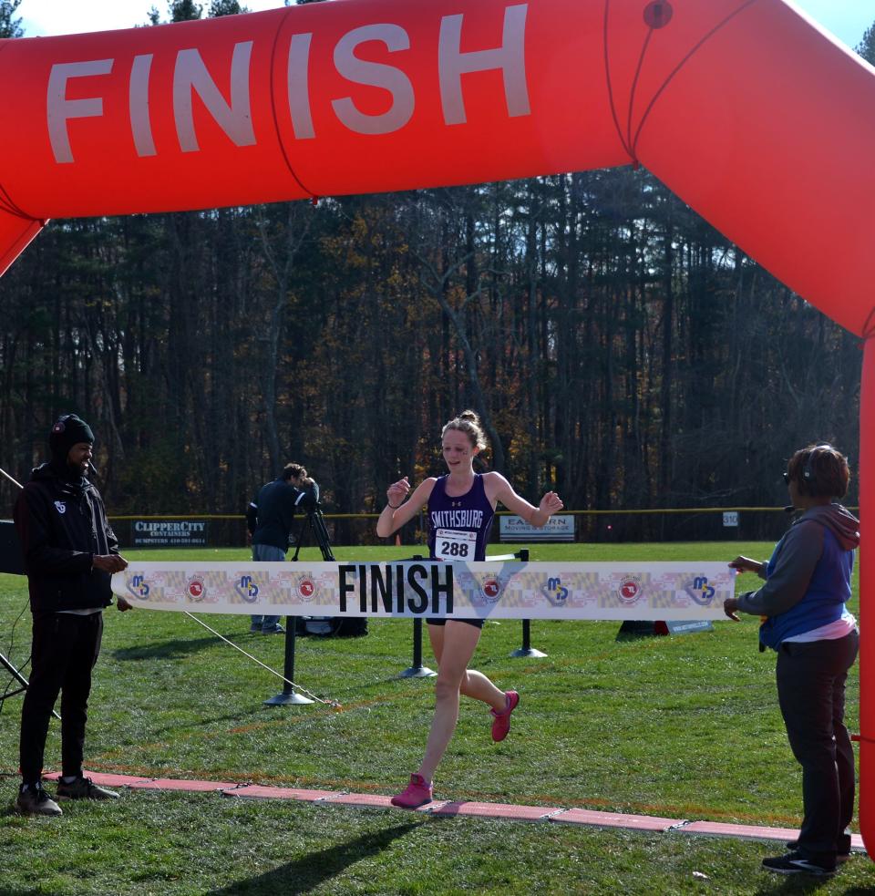 Smithsburg's Cora Gentzel crosses the finish line as the winner of the Maryland Class 1A girls cross country race in 19:43.05.