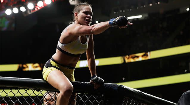 Amanda Nunes celebrates after defeating Miesha Tate during their women's bantamweight championship mixed martial arts bout at UFC 200. Photo: AP
