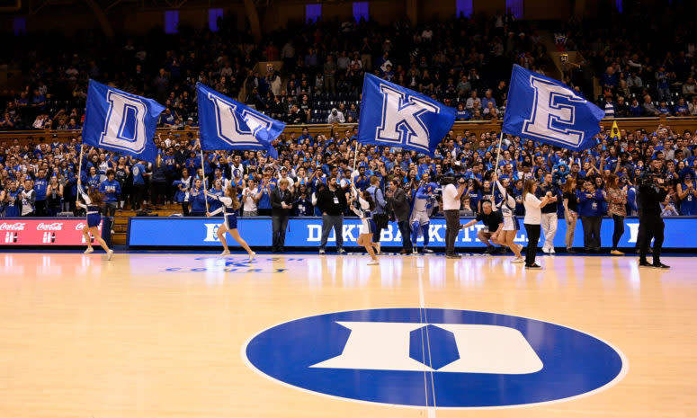 Duke basketball cheerleaders performing during a game.