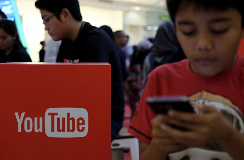 FILE PHOTO: People attend the YouTube Fanfest in Jakarta