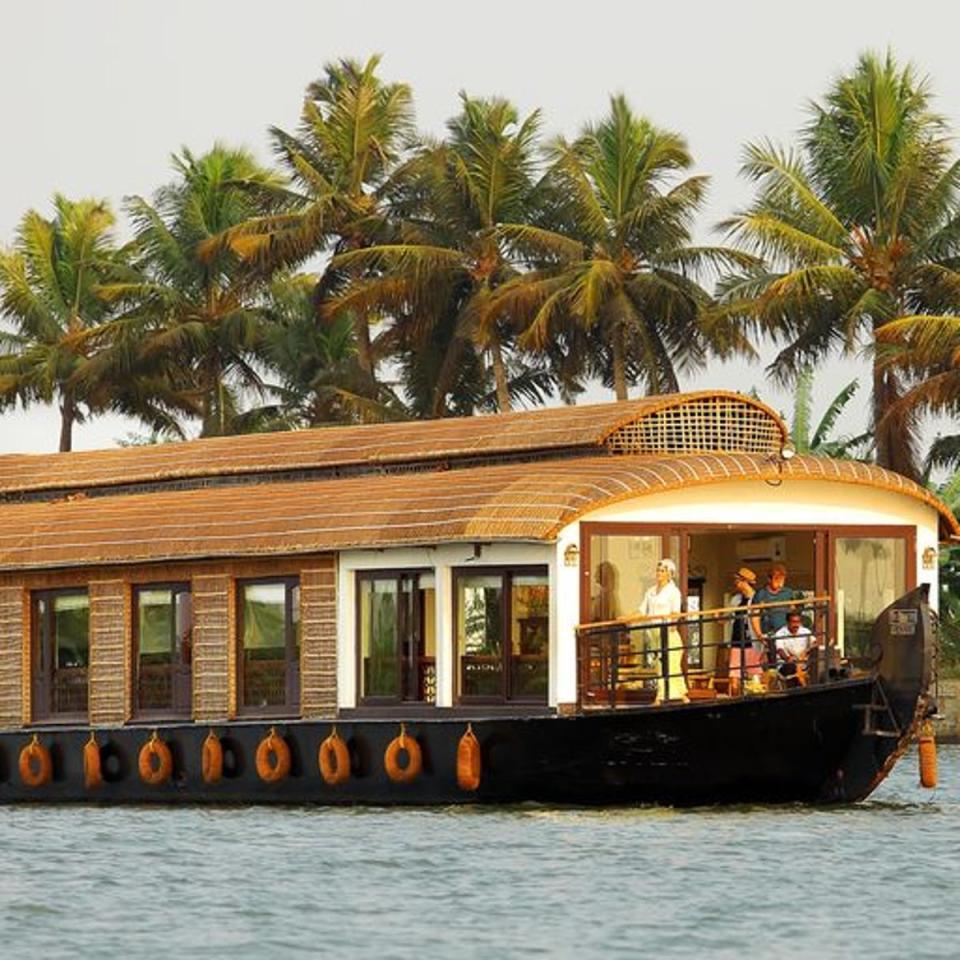 Houseboat rental service Spice Routes operates six Kettuvallams that sleep between two and 10 and are operated by a local crew (Spice Routes)