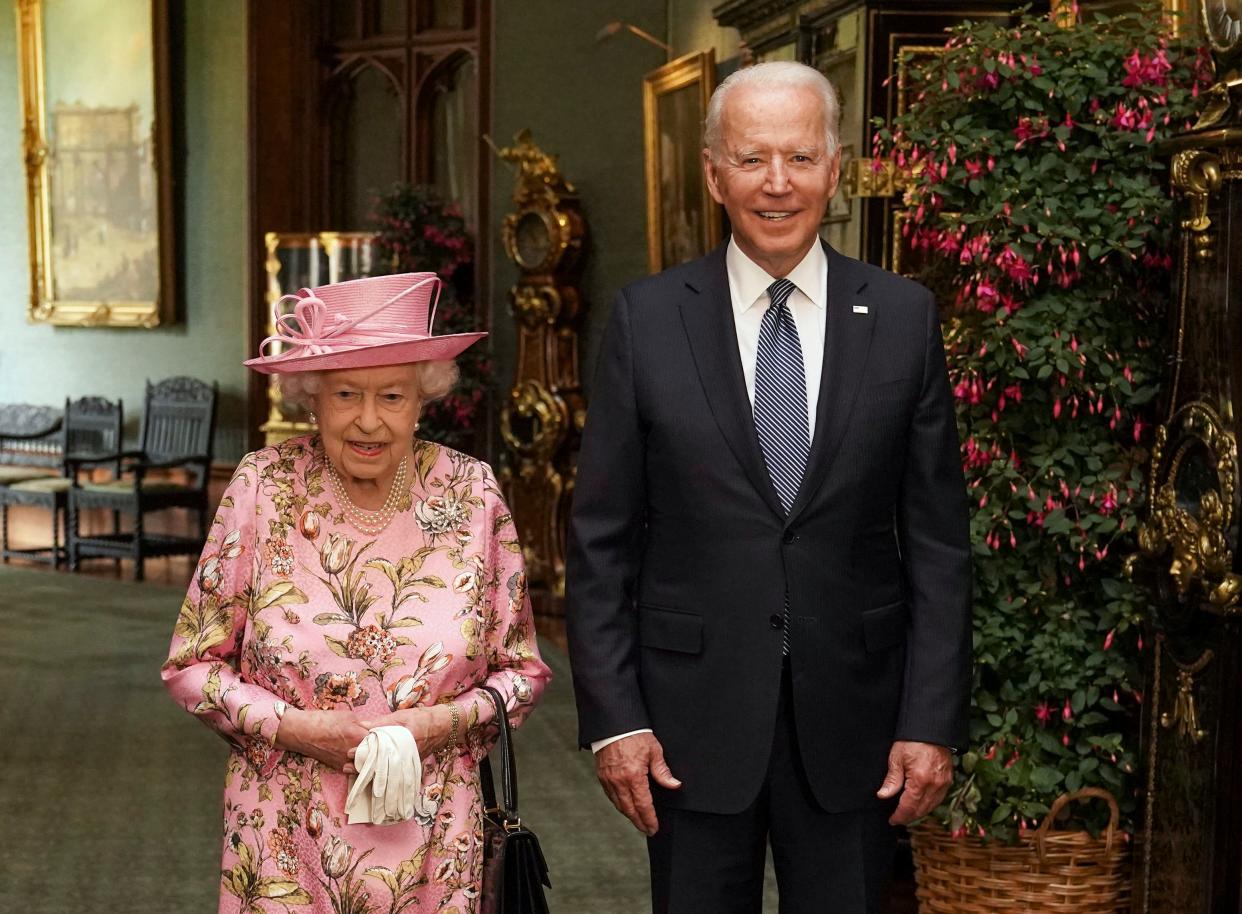 Queen Elizabeth II with US President Joe Biden in the Grand Corridor during their visit to Windsor Castle on 13 June, 2021 in Windsor, England. Queen Elizabeth II hosted US President, Joe Biden and First Lady Dr Jill Biden at Windsor Castle. The President arrived from Cornwall where he attended the G7 Leader's Summit and will travel on to Brussels for a meeting of NATO Allies and later in the week he will meet President of Russia, Vladimir Putin (Getty Images)