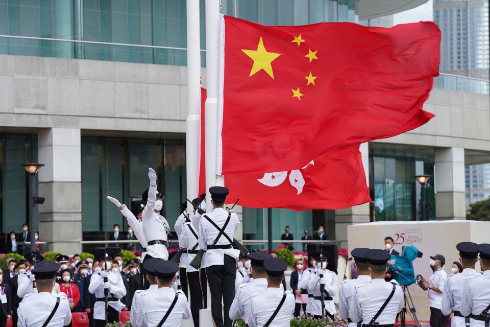 A flag-raising ceremony is held at the Golden Bauhinia Square to mark the 25th anniversary of the former British colony’s return to Chinese rule, in Hong Kong on July 1, 2022. - Credit: POOL/AFP via Getty Images
