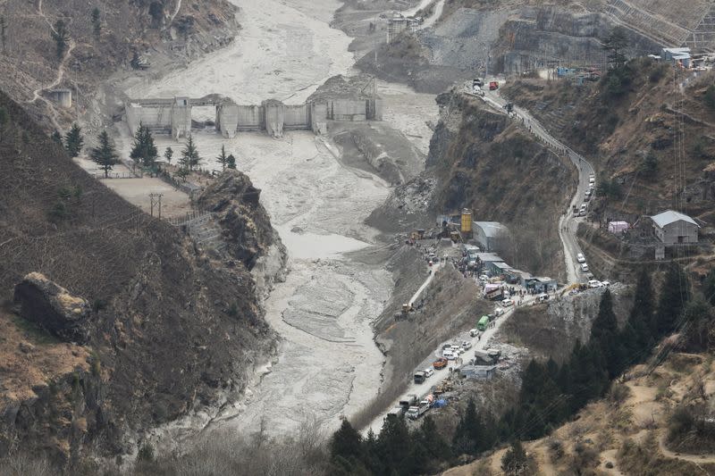 Rescue operation outside a tunnel after a part of a glacier broke away, in Tapovan