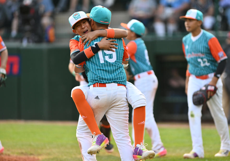 August 22, 2024; Williamsport, PA, USA; Latin American infielder Jose Perez (16) celebrates with infielder Diego Biarreta (19) after the game against Japan at Lamade Stadium. Mandatory Photo Credit: Kyle Ross-USA TODAY Sports