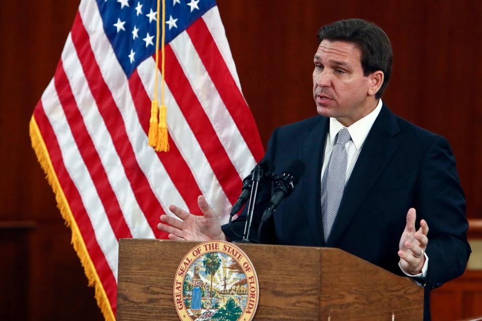 Florida Gov. Ron DeSantis answers questions from the media in the Florida Cabinet following his State of the State address during a joint session of the Senate and House of Representatives Tuesday, March 7, 2023, at the Capitol in Tallahassee, Florida.