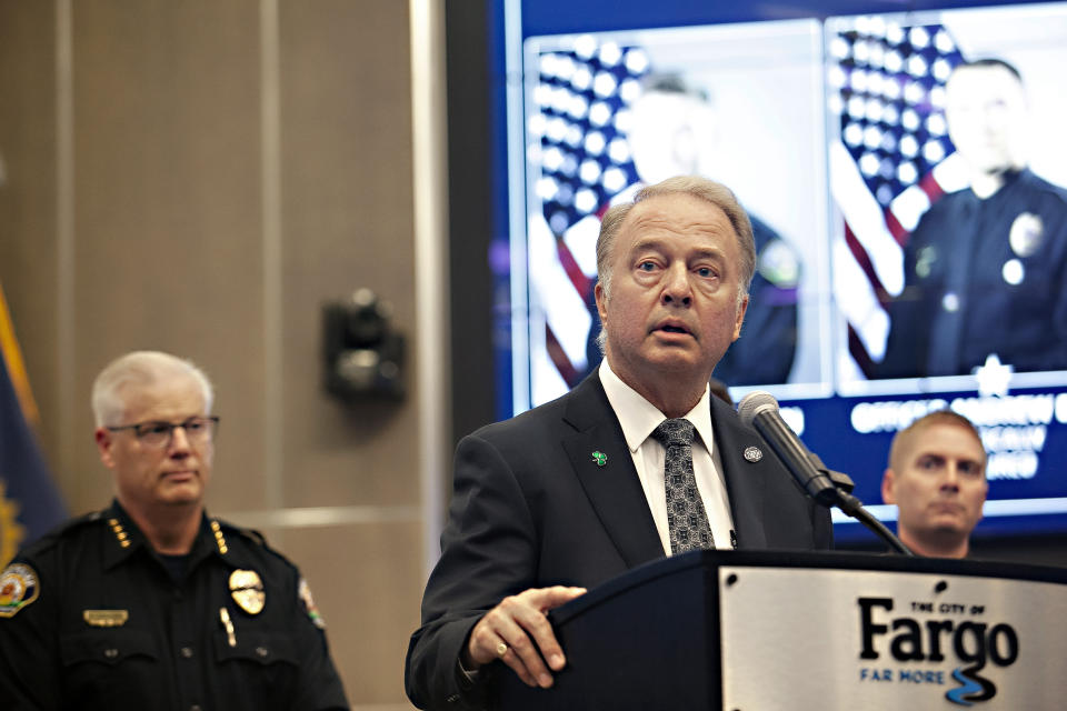 Mayor Tim Mahoney responds to questions about Friday's shooting during a news conference on Saturday, July 15, 2023, in Fargo, N.D. One police officer was fatally shot and two others were wounded in the shooting. Authorities said the suspect was also killed and a civilian was injured. (AP Photo/Ann Arbor Miller)