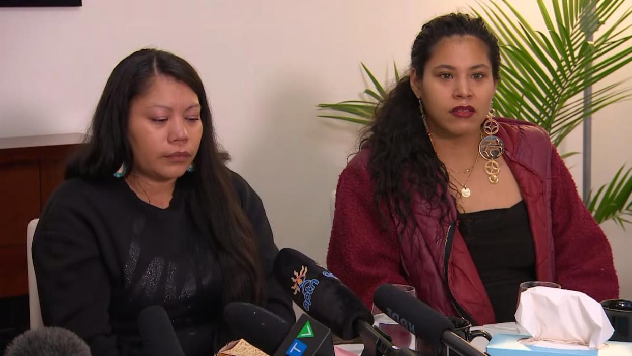 Lorelei Williams, left, and Sarah Jean de Vries both had family members whose DNA was found on Robert Pickton's farm. They spoke at a news conference on Monday against a move to dispose of evidence from the serial killer's 2007 trial. (Mike Zimmer/CBC News - image credit)