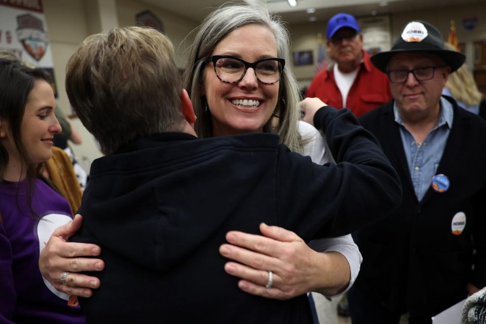 PHOENIX, ARIZONA - NOVEMBER 05: Arizona Democratic gubernatorial candidate Katie Hobbs greets supporters during a campaign event at the Carpenters Local Union 1912 headquarters on November 05, 2022 in Phoenix, Arizona. With three days to go before election day, Arizona democratic gubernatorial candidate Katie Hobbs continues to campaign across the state as she faces a tight race against Trump endorsed republican candidate Kari Lake. (Photo by Kevin Dietsch/Getty Images)