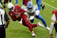 Arizona Cardinals quarterback Kyler Murray lunges for the end zone for a touchdown as Detroit Lions strong safety Duron Harmon (26) defends during the first half of an NFL football game, Sunday, Sept. 27, 2020, in Glendale, Ariz. (AP Photo/Rick Scuteri)