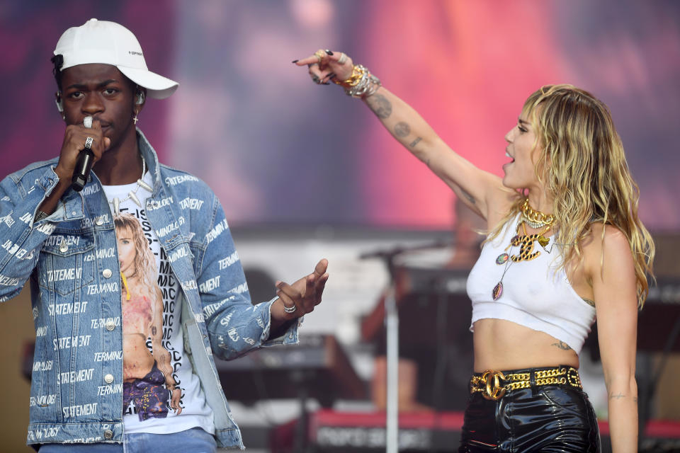 GLASTONBURY, ENGLAND - JUNE 30: Lil Nas X and Miley Cyrus perform on the Pyramid stage during day five of Glastonbury Festival at Worthy Farm, Pilton on June 30, 2019 in Glastonbury, England. (Photo by Dave J Hogan/Getty Images)