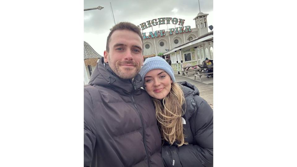 A heterosexual couple on Brighton Palace Pier