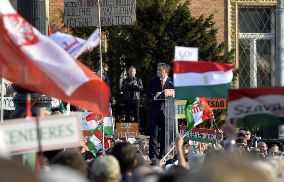 Hungarian Prime Minister and Chairman of ruling centre right Fidesz party Viktor Orban addresses the election rally of Fidesz and its coalition ally Christian Democratic People’s Party in Heroes’ Square in Budapest, Hungary, Saturday, March 29, 2014. The parliamentary elections are held on April 6, 2014 in Hungary. (AP Photo/MTI, Zoltan Mathe)