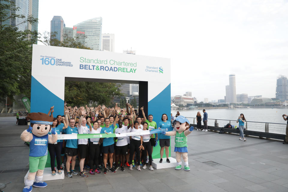 Participants for the Singapore stop of the Belt and Run Relay before the start of the 3.2km run around Marina Bay Waterfront. (PHOTO: Standard Chartered Singapore)