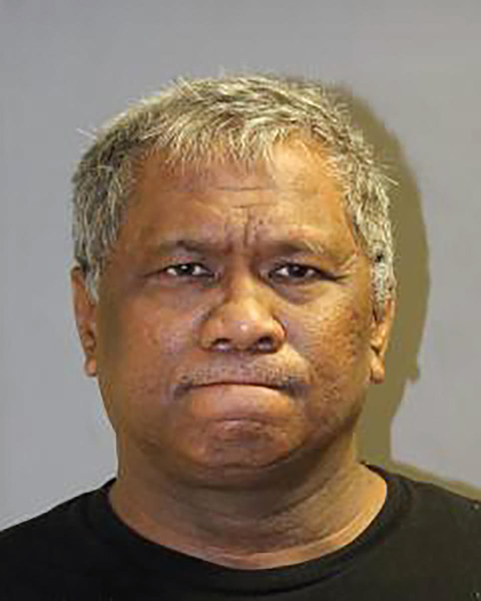 FILE - This undated photo provided by the Honolulu Police Department shows Isaac Kalua. A Hawaii couple accused of killing their 6-year-old adoptive daughter a month before reporting her missing has pleaded not guilty to murder. A grand jury previously indicted Isaac and Lehua Kalua on murder and other charges. During a court hearing Monday, Nov. 29, 2021, they pleaded not guilty via video from jail. (Honolulu Police Department via AP, File)