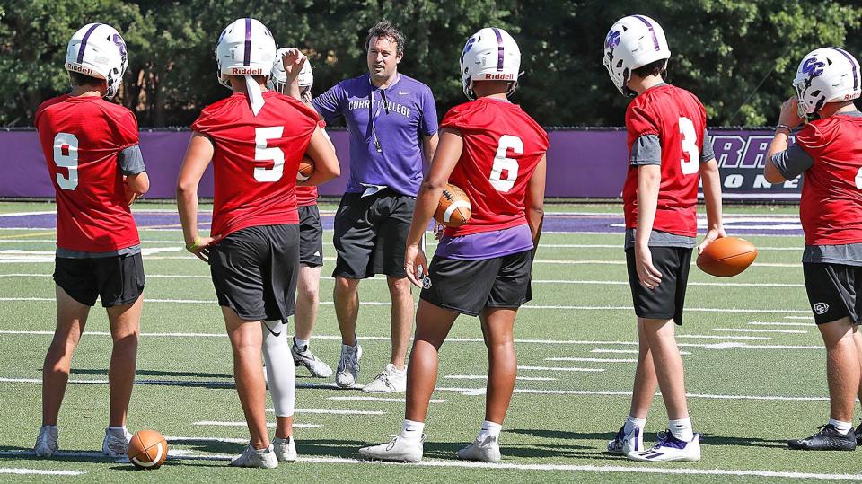 Coach Todd Parsons with the quarterback tryouts. The Curry College Colonels football team starts the season with a new head coach Todd Parsons on Friday, Aug. 12, 2022.