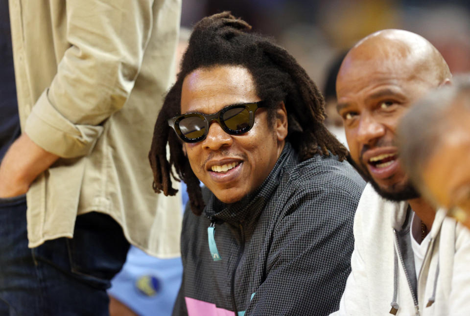 Closeup of Jay-Z sitting at an event