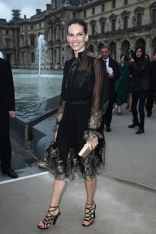 <p>Julien Hekimian/Getty</p> Hilary Swank attends the Salvatore Ferragamo Cruise Collection 2013 Show at Galerie Denon on June 12, 2012 in Paris