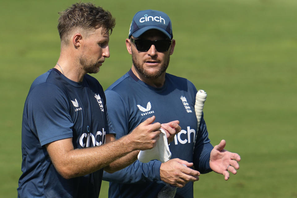 England's Joe Root talks to team coach Brendon McCullum during a practice session a day ahead their second cricket test match against India, in Visakhapatnam, India, Thursday, Feb. 1, 2024. (AP Photo/Manish Swarup)