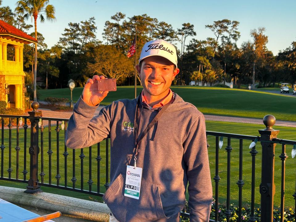 Raul Pereda shows off his PGA Tour card for the 2024 season after tying for fourth at PGA Tour Q-School at the TPC Sawgrass Dye's Valley.