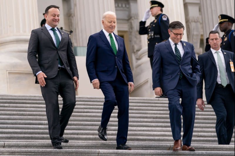 Ireland's Taoiseach Leo Varadkar (L to R), U.S. President Joe Biden and House Speaker Mike Johnson, R-La., depart the Capitol following the Friends of Ireland Luncheon Friday. Photo by Nathan Howard/UPI