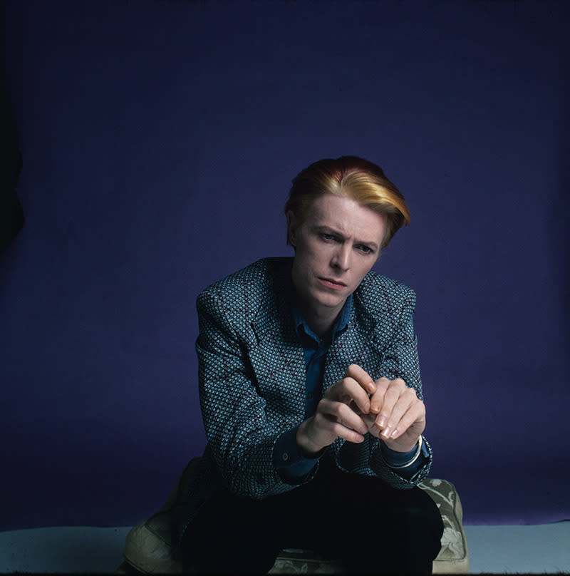 “David out of character. One of my favorite photos of David. I particularly like his hands in this shot. Los Angeles, 1975.”