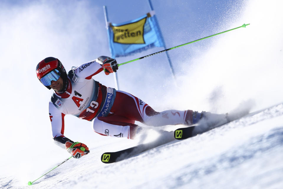 Austria's Roland Leitinger speeds down the course during an alpine ski, men's World Cup giant slalom, in Soelden, Austria, Sunday, Oct. 24, 2021. (AP Photo/Marco Trovati)