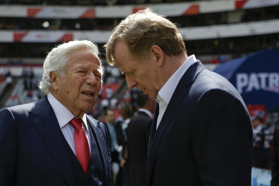 FILE - In this Nov. 19, 2017, file photo, NFL Commissioner Roger Goodell, right, talks with New England Patriots owner Robert Kraft before the Patriots face the Oakland Raiders in an NFL football game in Mexico City. Pending the completion of police investigations in Florida, and likely a league probe as well, Goodell could punish Kraft for being charged with two counts of soliciting a prostitute. The 77-year-old Kraft was twice videotaped in a sex act at a shopping-center massage parlor in Florida, police said Friday, Feb. 22, 2019. (AP Photo/Rebecca Blackwell, File)