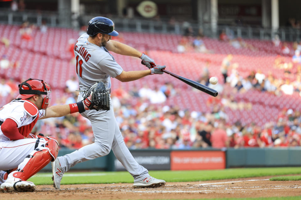 St. Louis Cardinals' Paul DeJong hits a three-run home run during the second inning of a baseball game against the Cincinnati Reds in Cincinnati, Monday, May 22, 2023. AP Photo/Aaron Doster)