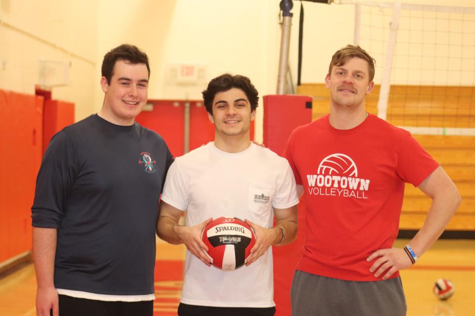 St. John's boys' volleyball senior captains, from left, Harrison Ganong on left and Dan Wickstrom and coach Dan Seaver, right.