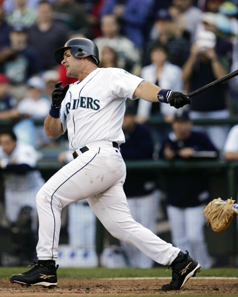 FILE - In this Oct. 3, 2004, file photo, Seattle Mariners' Edgar Martinez makes the final swing of his career, against the Texas Rangers, in Seattle. Martinez finished with a .312 career average in 18 seasons, all with Seattle. Martinez was elected to baseball's Hall of Fame Tuesday, Jan. 22, 2019. (AP Photo/Elaine Thompson, File)