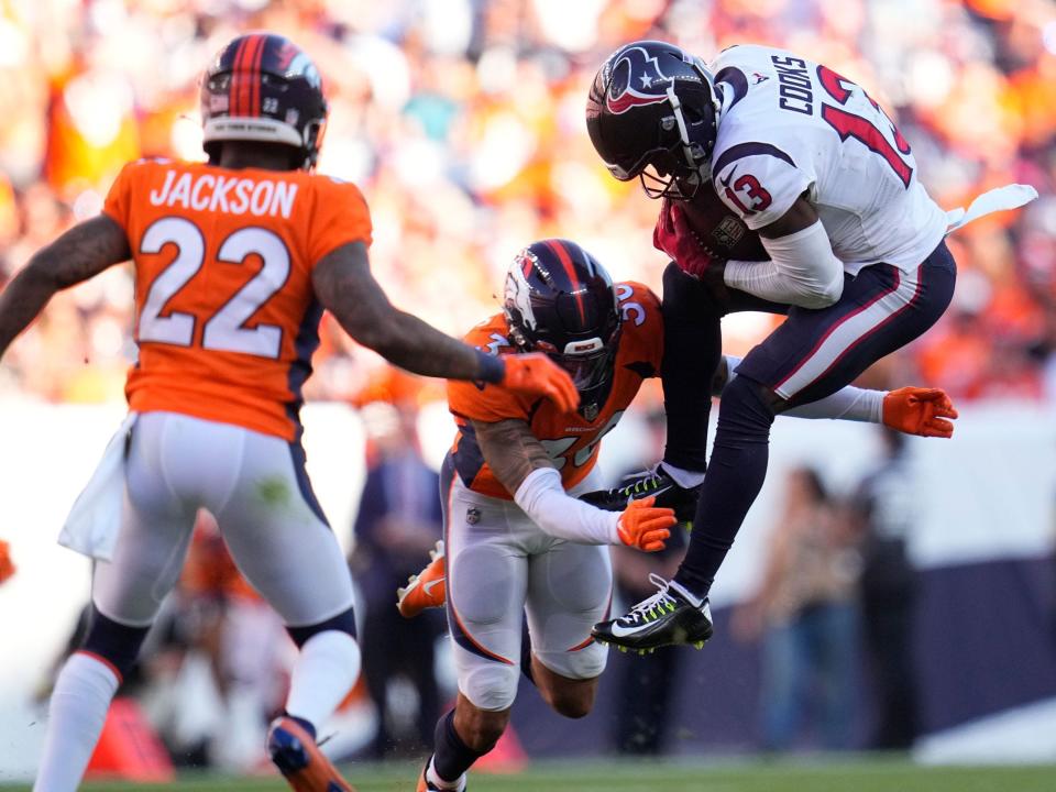 Brandin Cooks makes a catch against the Denver Broncos.