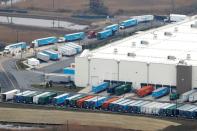 Amazon.com trucks are seen at an Amazon warehouse in Staten Island in New York City